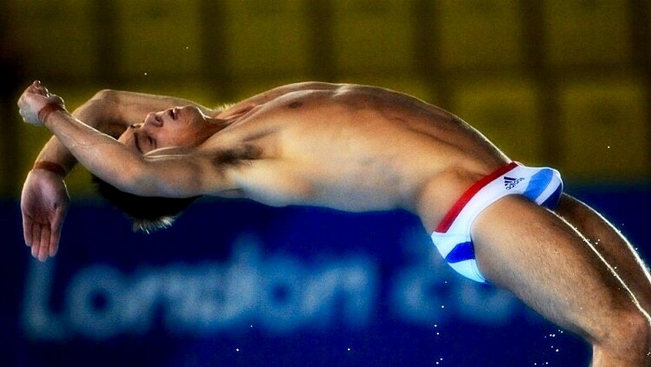 Semi Naked Man Dives On Bonnet For Safety Demo.