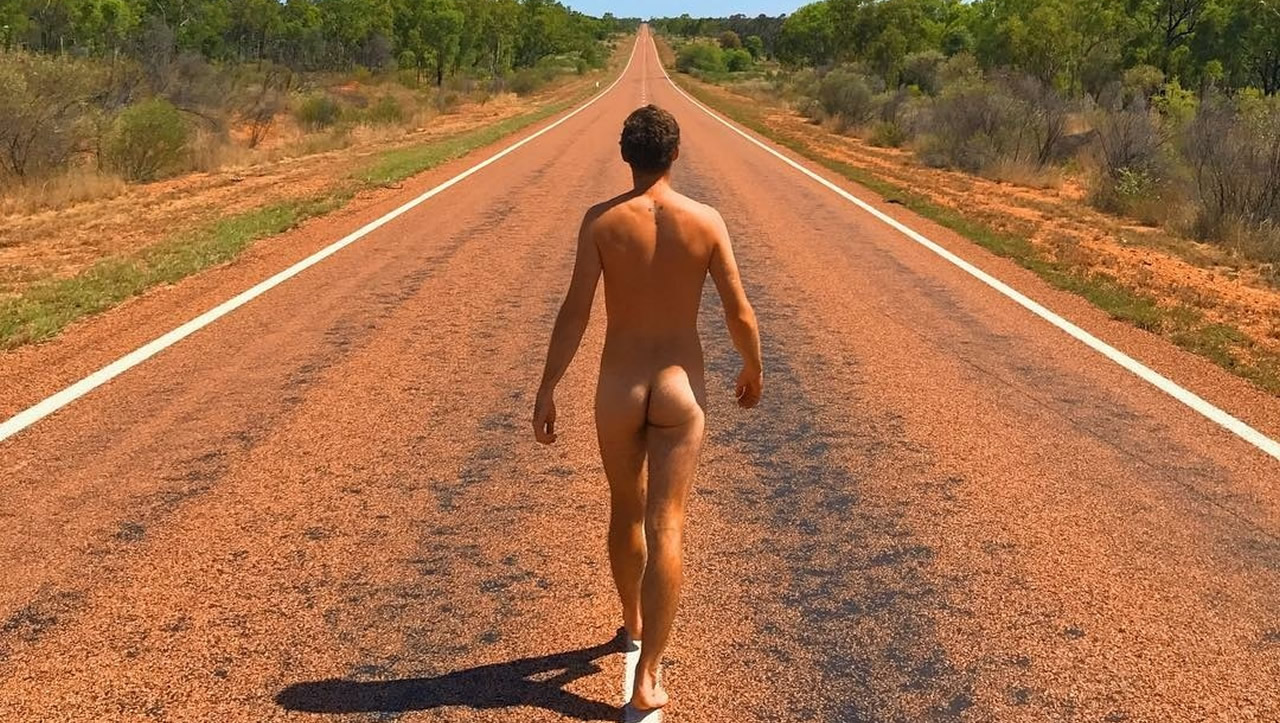 Rearview Fit Guy Walking Naked Down a Country Road.