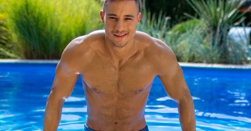 Shirtless Hunk at the Edge of a Pool