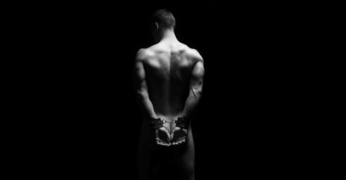 Black and White Rearview Cuffed Guy