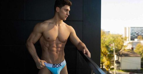 Athletic Guy in Light Blue Box Briefs on a Balcony