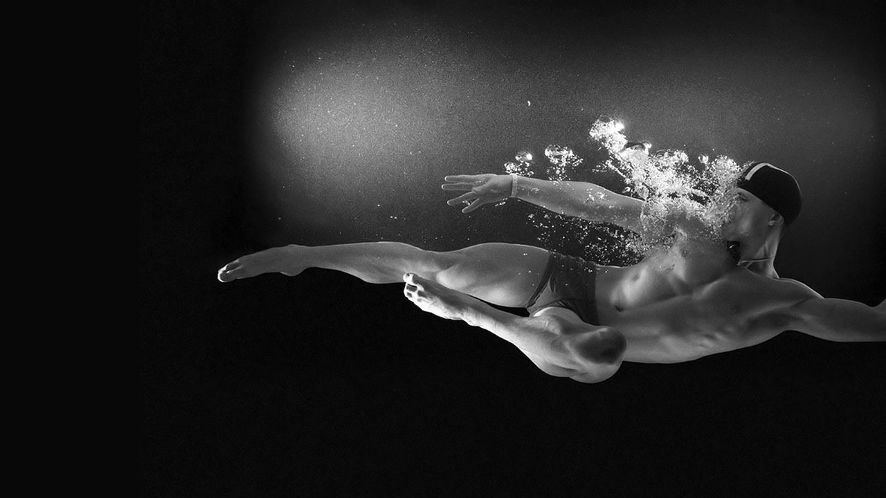 Black and White Swimmer Underwater