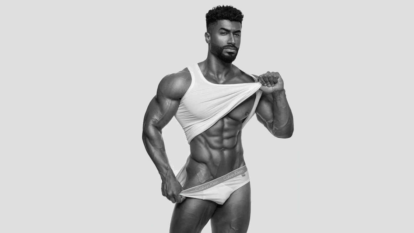 Black and White Muscular Stud in Calvin Klein Briefs and a Tank Top