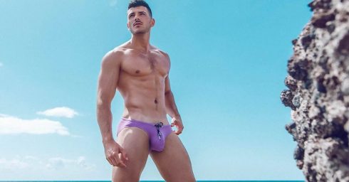 Fit Guy in a Purple Bikini