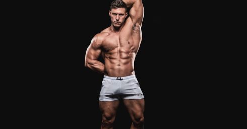 Muscular Hunk in White Shorts