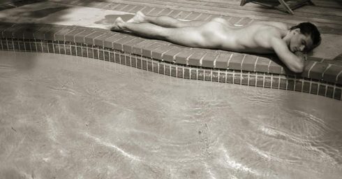 Black and White Naked Guy by a Pool