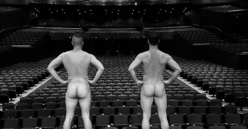 Black and White Rearview Two Guys Naked in an Empty Theatre