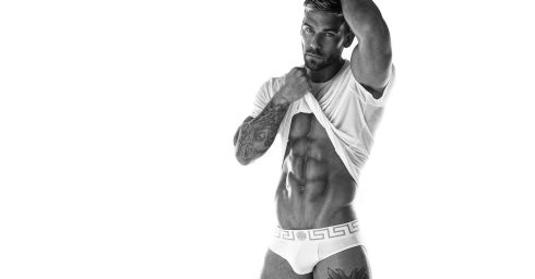 Ripped Guy in a White Tee and Briefs