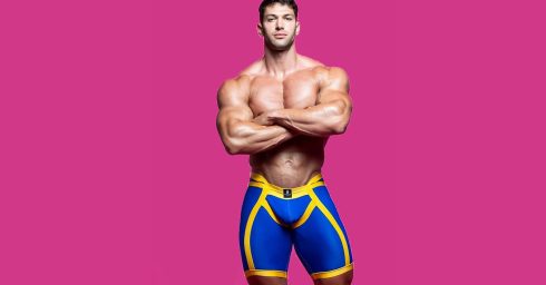 Muscular Young Stud in Blue and Yellow Shorts