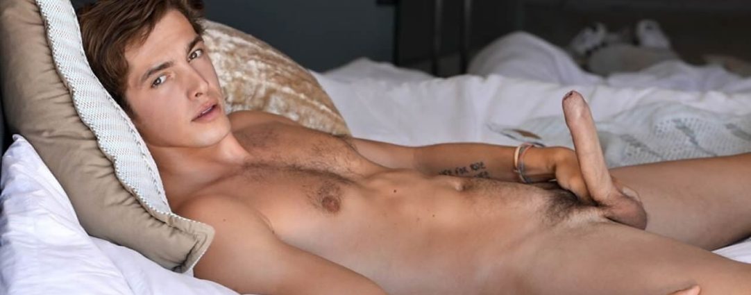 Young Guy with a Hardon in Bed