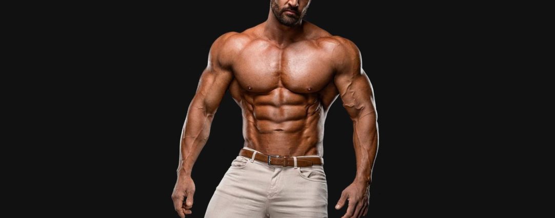 Shirtless Bodybuilder in White Pants