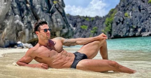 Fit Hunk in a Black Bikini at the Waters Edge