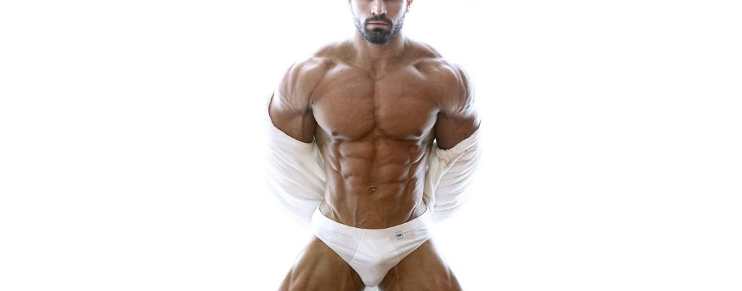Muscular Stud in White Briefs