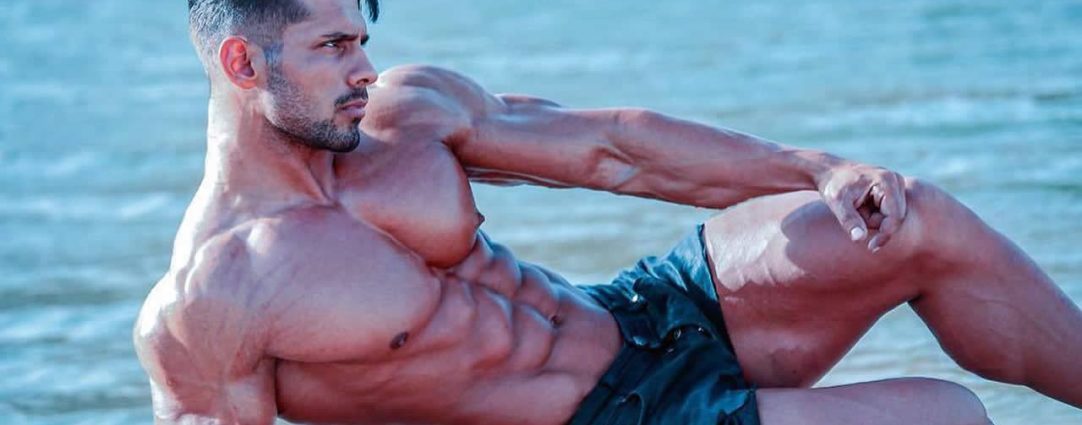 Ripped Stud in Shorts by the Waters Edge