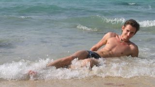 Fit Young Guy at the Waters Edge