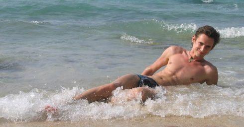 Fit Young Guy at the Waters Edge