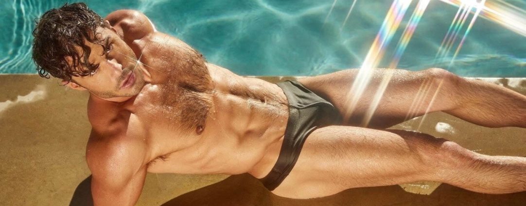 Young Hunk in a Bikini by a Pool