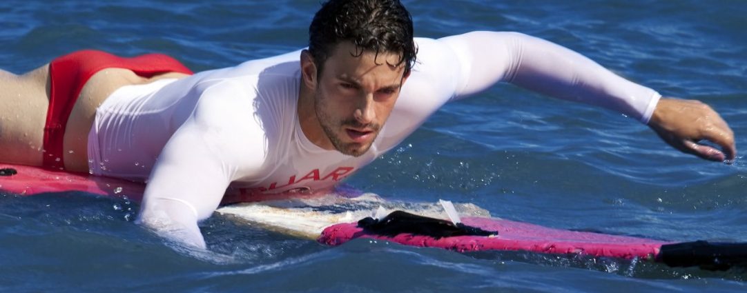 Fit Guy with a Nice Ass on a Surfboard