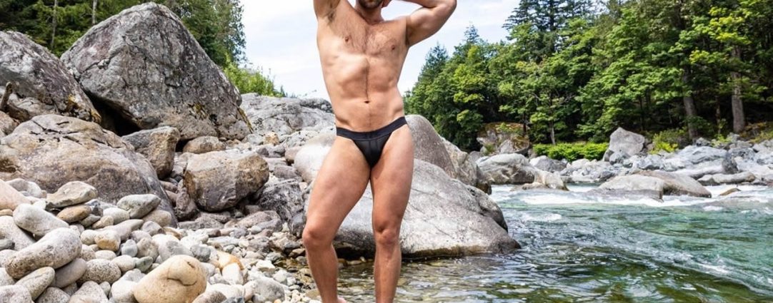 Fit Hunk by a Stream in the Woods