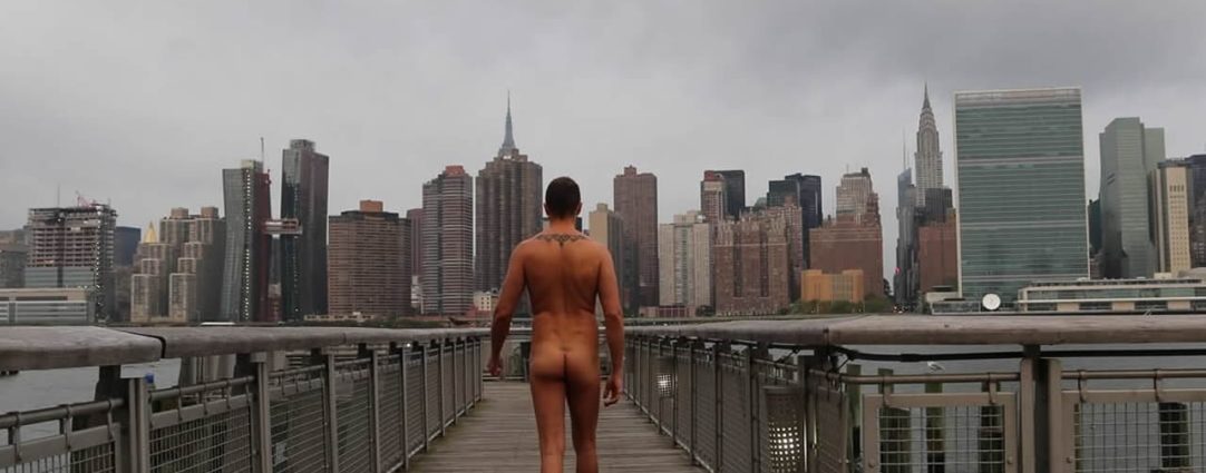 Rearview Naked Guy on a Pier