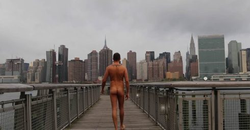Rearview Naked Guy on a Pier