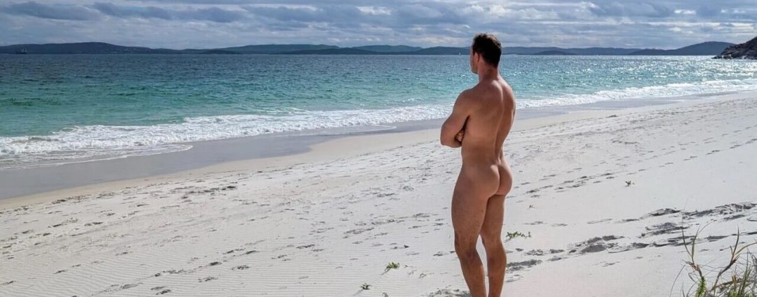Rearview Athletic Guy Naked on a Beach