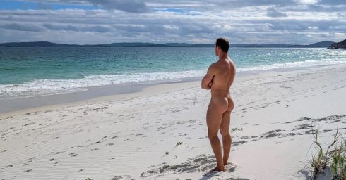 Rearview Athletic Guy Naked on a Beach