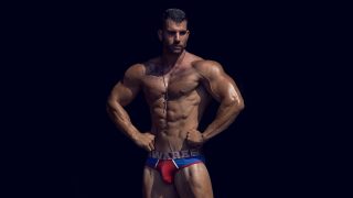 Muscular Hunk in Red and Blue Briefs