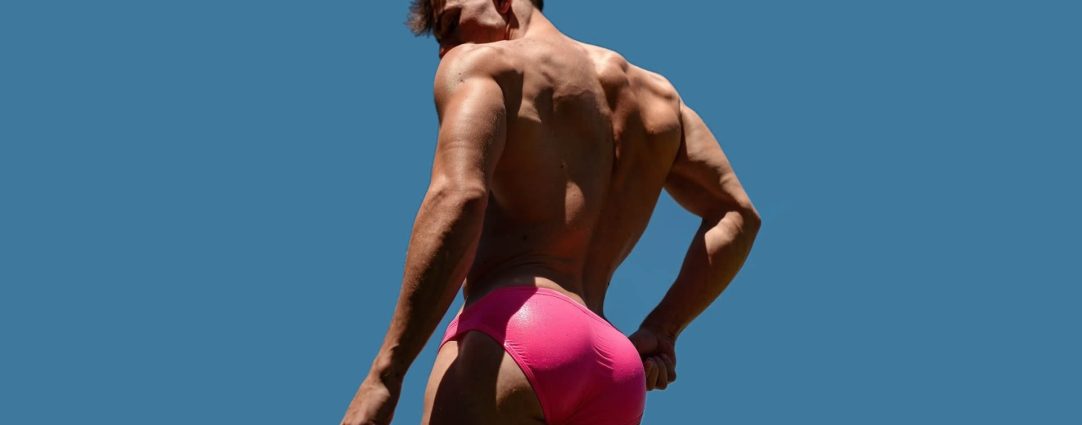 Rearview Athletic Guy in a Pink Bikini
