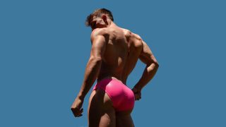 Rearview Athletic Guy in a Pink Bikini