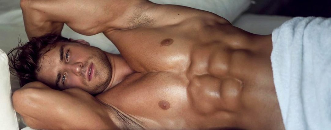 Ripped Young Stud Naked in Bed