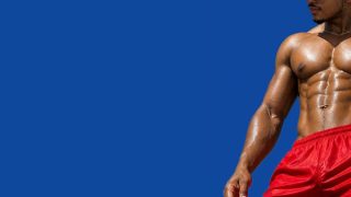 Fit Guy Shirtless in Red Shorts